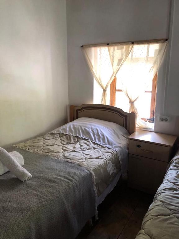 Posteľ alebo postele v izbe v ubytovaní Guesthouse Kujtimi