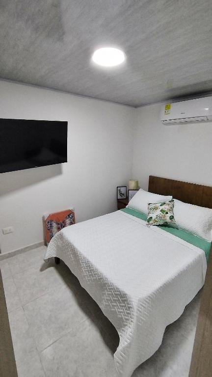 Postel nebo postele na pokoji v ubytování Edificio GrandSky