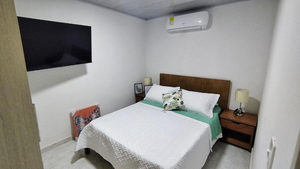 Postel nebo postele na pokoji v ubytování Edificio GrandSky
