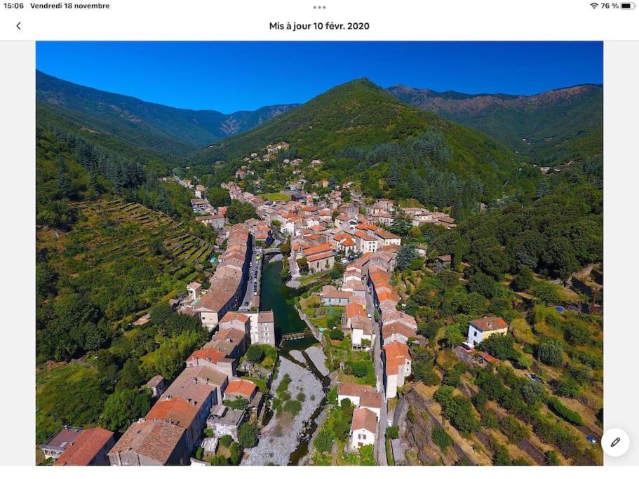 an aerial view of a small town in the mountains at Le petit Luxembourg in Valleraugue