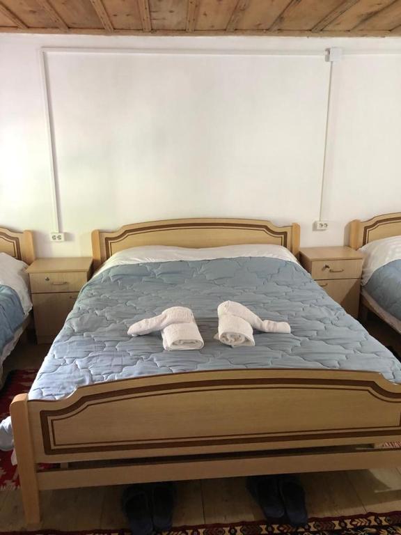 Posteľ alebo postele v izbe v ubytovaní Guesthouse Kujtimi