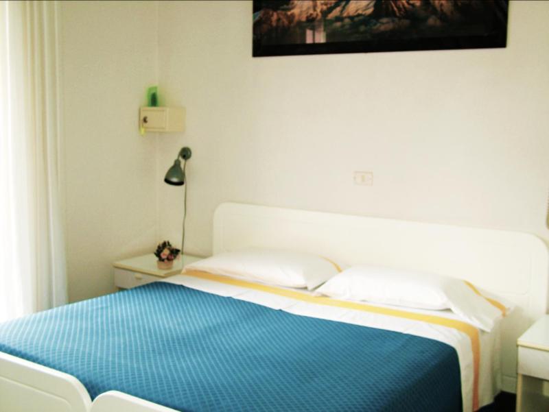 Postel nebo postele na pokoji v ubytování Hotel Tuscolano