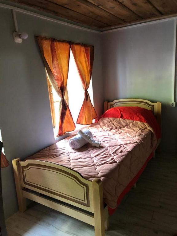 Posteľ alebo postele v izbe v ubytovaní Guesthouse Kujtimi