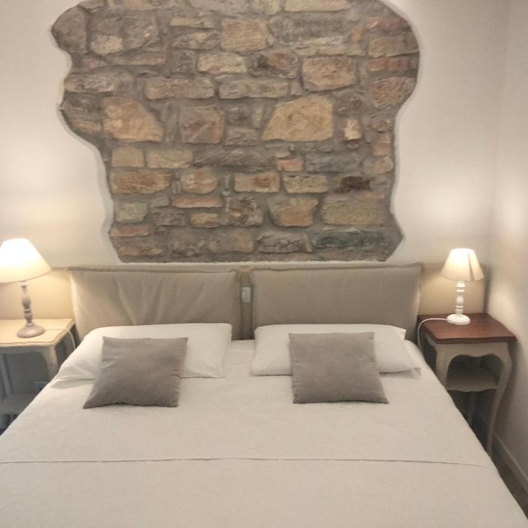 Postel nebo postele na pokoji v ubytování Al San Lorenzo