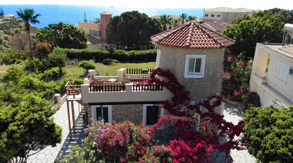an aerial view of a house with flowers at Casa Bella a Skala 3 in Skala Kefalonias