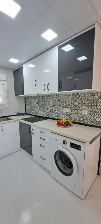 Kuchyňa alebo kuchynka v ubytovaní APARTAMENTO HECO