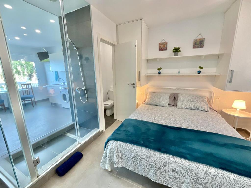 Postel nebo postele na pokoji v ubytování Blue Oasis