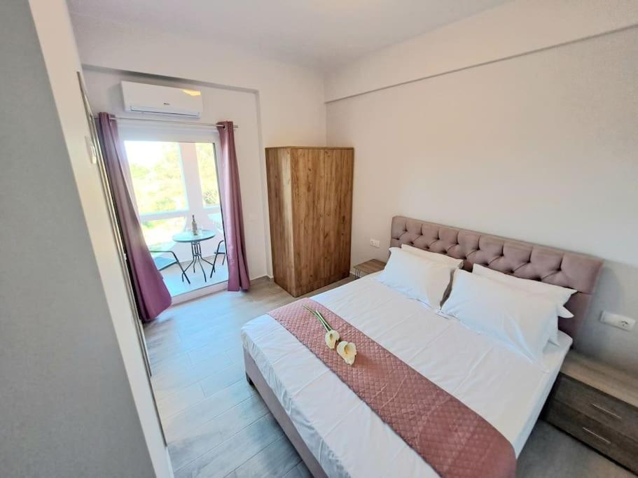 Ένα ή περισσότερα κρεβάτια σε δωμάτιο στο Andreas' Guest House