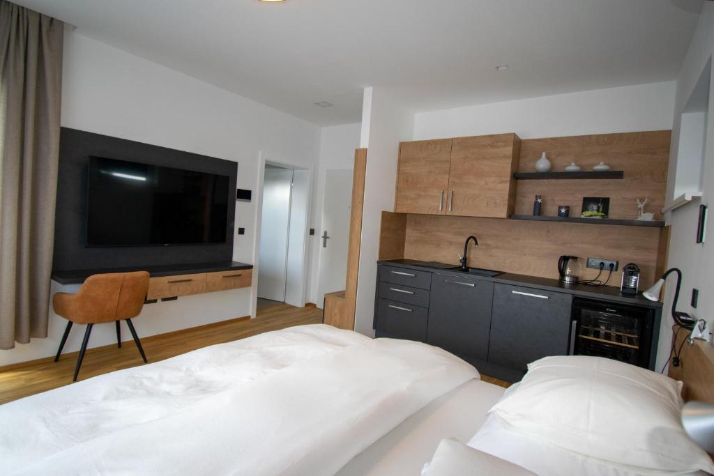 Letto o letti in una camera di Smart Rooms Wels