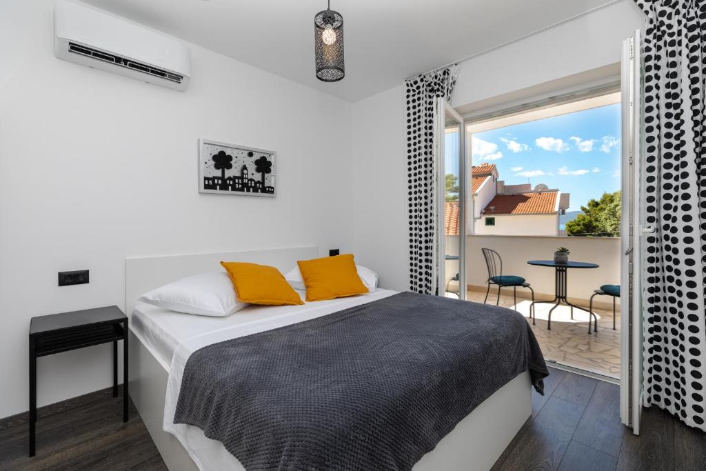 Posteľ alebo postele v izbe v ubytovaní Luxury Apartman Tinel