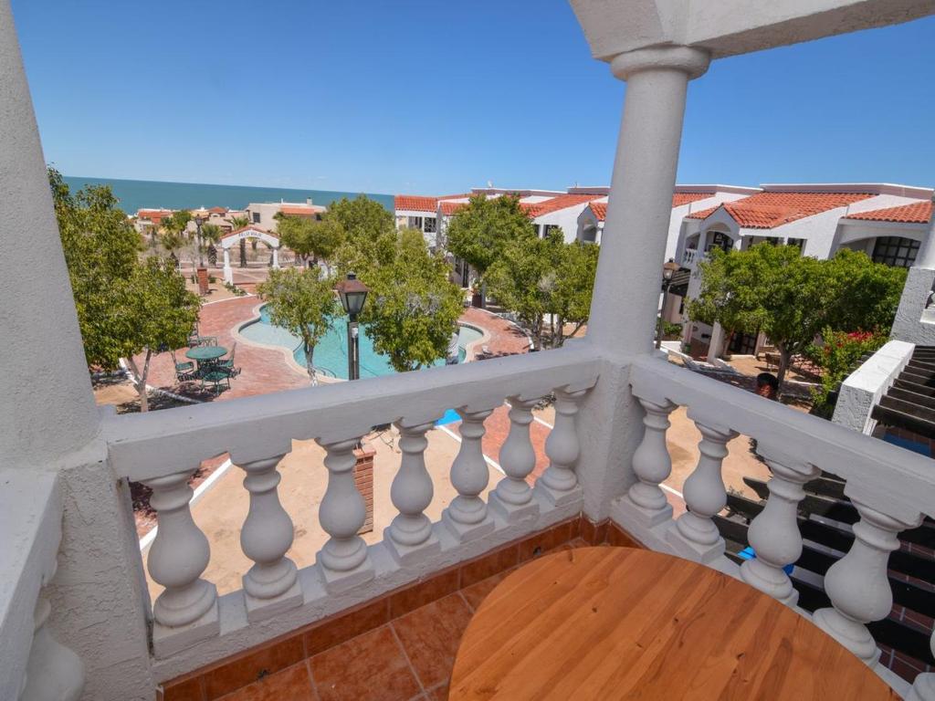 a balcony with a view of the ocean at La Hacienda San Felipe Condo 10 in San Felipe