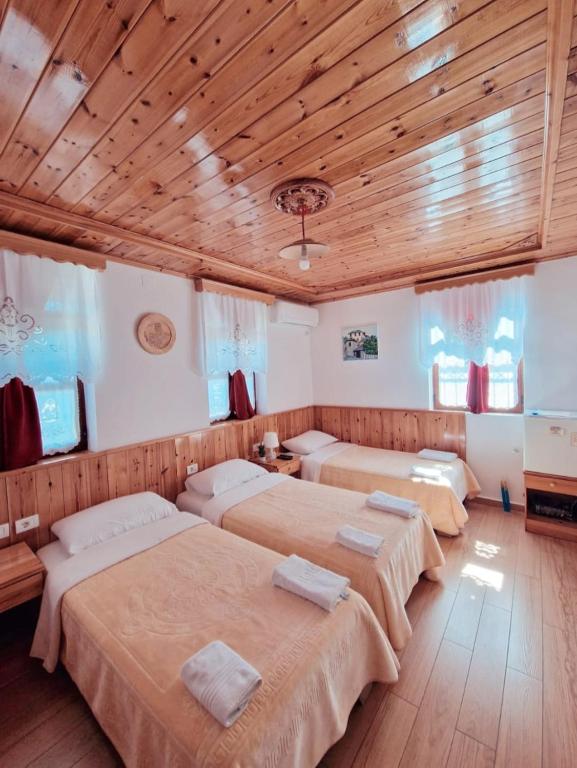 Postel nebo postele na pokoji v ubytování Hotel Domino