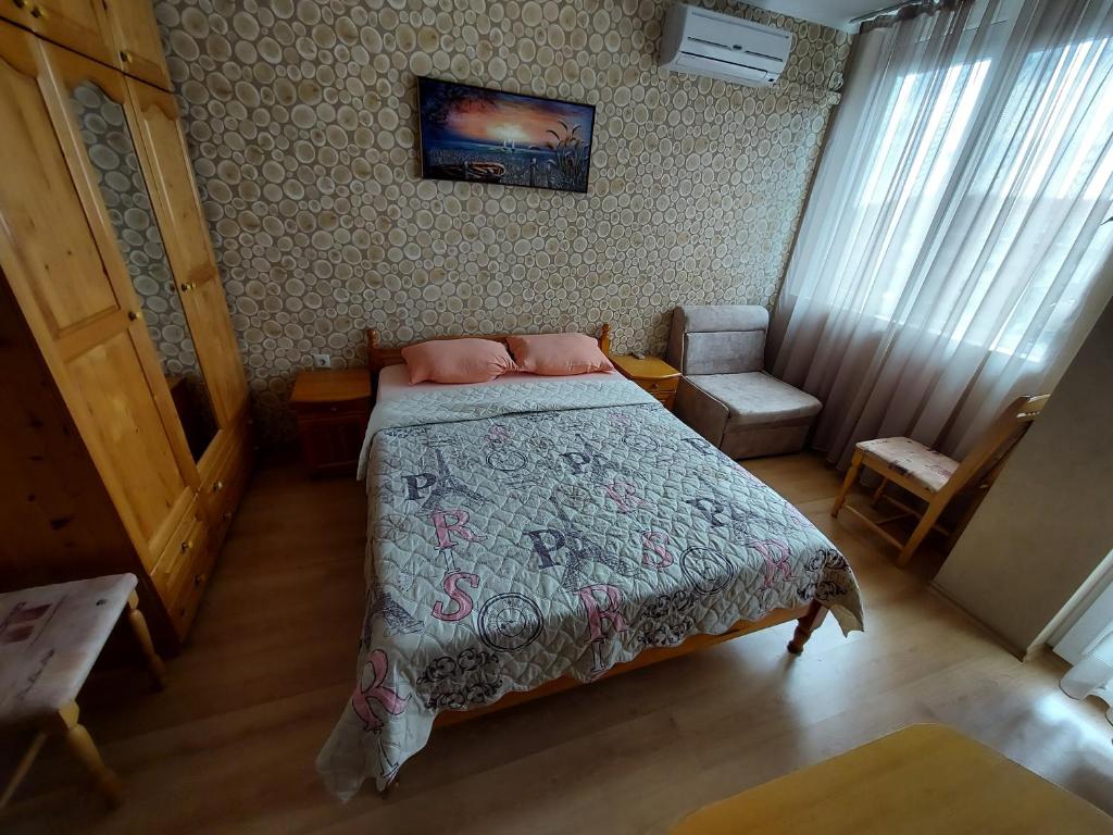 Postel nebo postele na pokoji v ubytování Апартамент Кънтри-Лариса