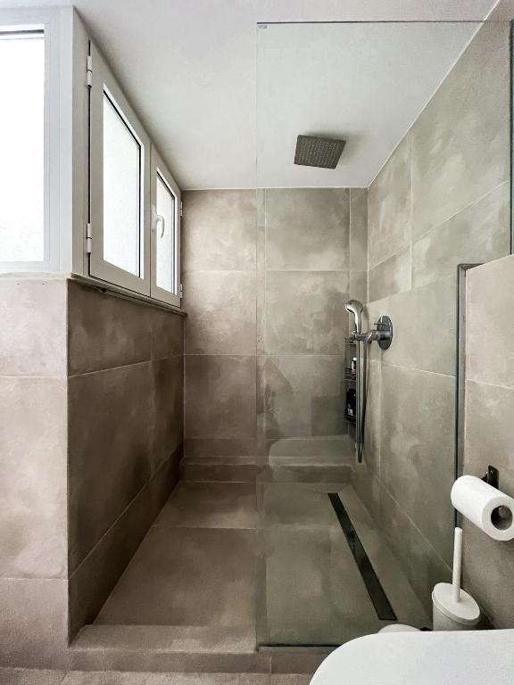 Koupelna v ubytování Porto Pireo Penthouse Sea View