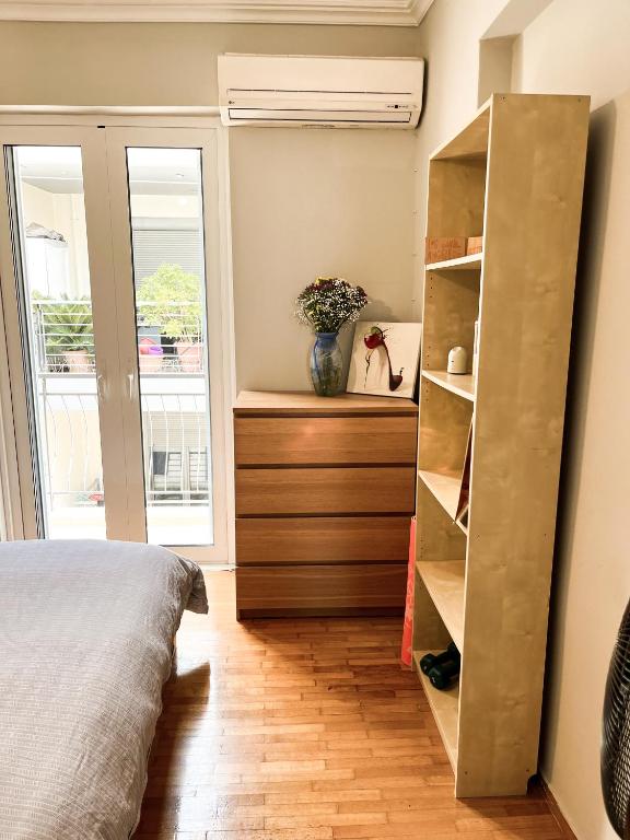 Postel nebo postele na pokoji v ubytování Porto Pireo Penthouse Sea View