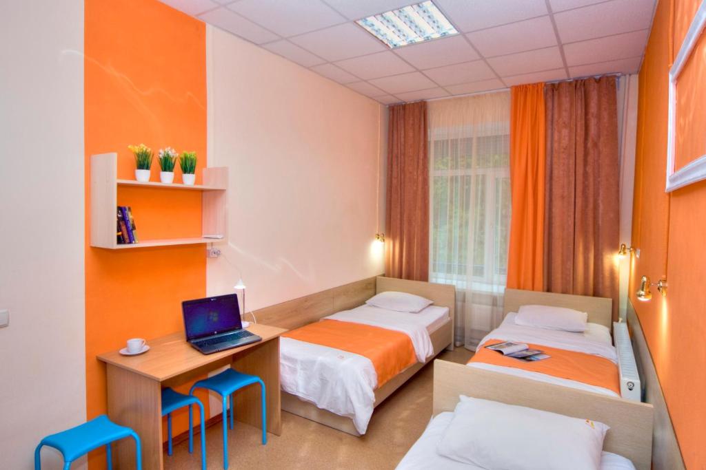 Postel nebo postele na pokoji v ubytování Podolski Hostel