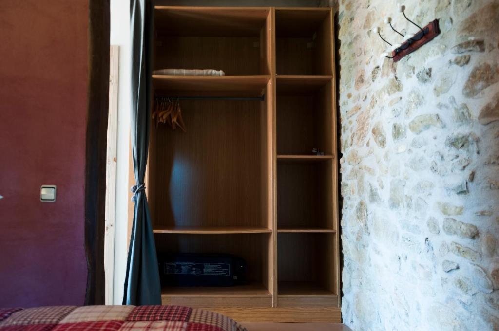 Postel nebo postele na pokoji v ubytování Mas Ombravella