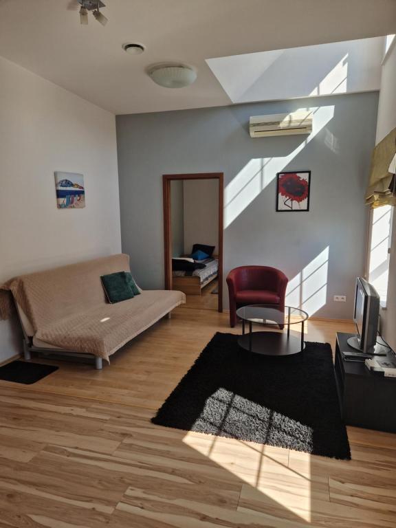 Posedenie v ubytovaní Apartamenty „Lofty w piecowni”