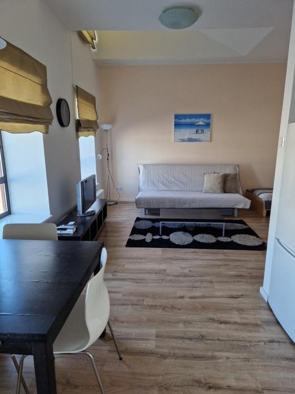 Posedenie v ubytovaní Apartamenty „Lofty w piecowni”