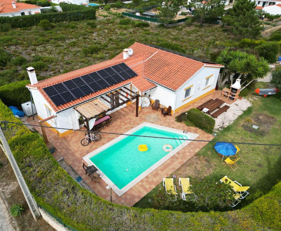an aerial view of a house with a swimming pool at Casa Ensolarada B&B and Pottery in Aljezur