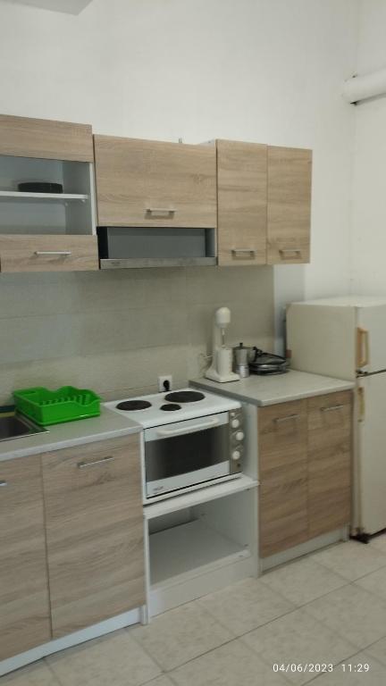 Kuchyň nebo kuchyňský kout v ubytování Sarantakis Apartments