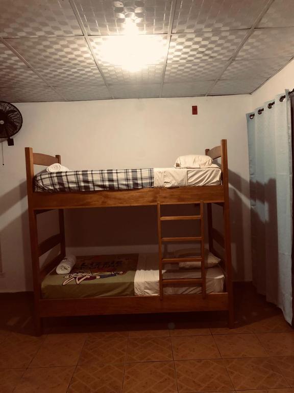 Voodi või voodid majutusasutuse Hostal Dilu Boquete toas