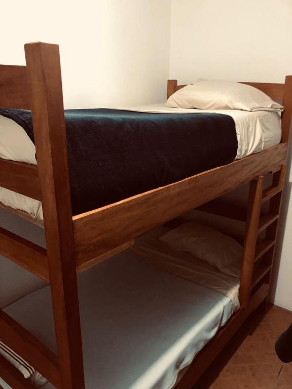 Voodi või voodid majutusasutuse Hostal Dilu Boquete toas