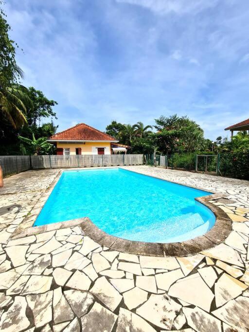 Bazén v ubytování Ti Colibri - 1ch - 4p - Plage 150m - Jardin privé nebo v jeho okolí