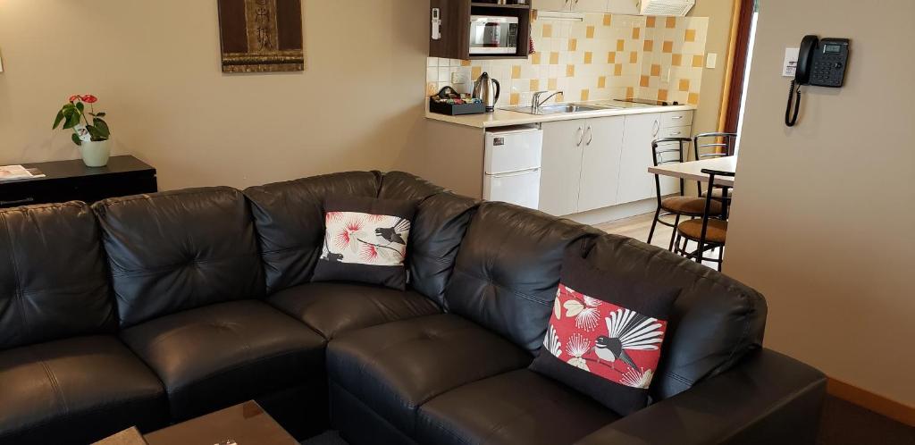 Kuchyň nebo kuchyňský kout v ubytování Settlers Boutique Motel
