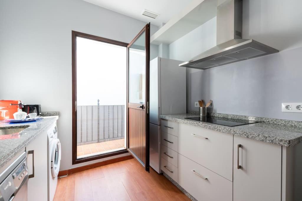 Kuchyň nebo kuchyňský kout v ubytování Cómodo apartamento en Almonte