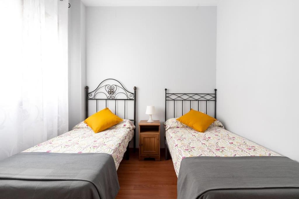 Postel nebo postele na pokoji v ubytování Cómodo apartamento en Almonte