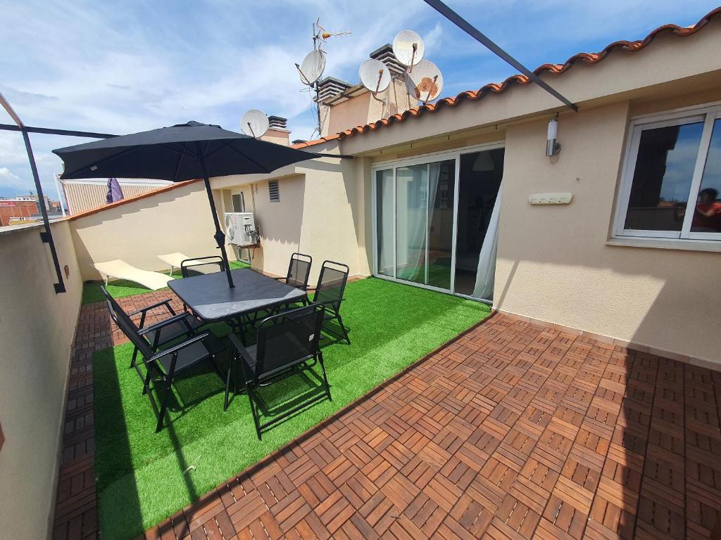 Patio alebo iná vonkajšia časť ubytovania Penthouse Blanes