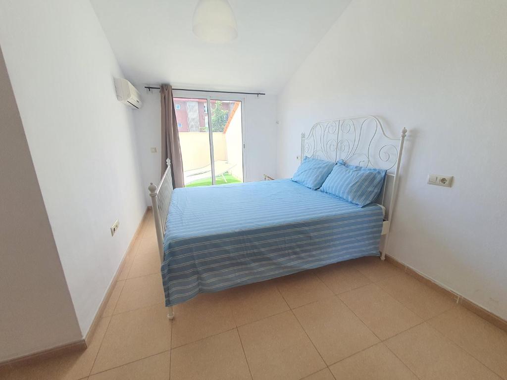 Posteľ alebo postele v izbe v ubytovaní Penthouse Blanes
