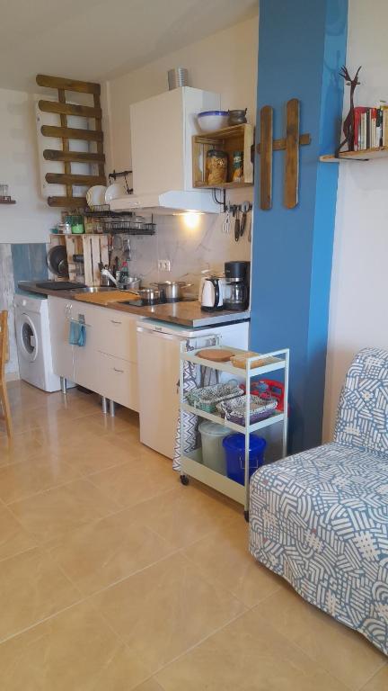Kuchyň nebo kuchyňský kout v ubytování Los Abrigos 2 apartments Guest House Ocean relax, wifi, playas