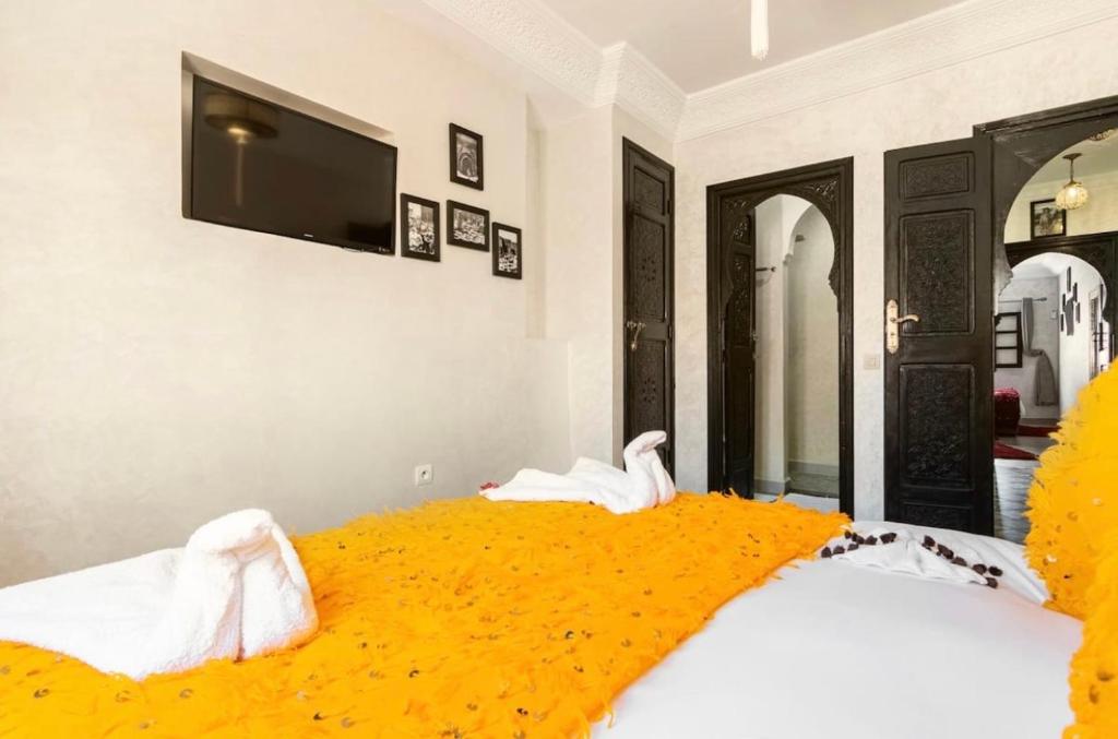 Postel nebo postele na pokoji v ubytování Riad Dar IMANE