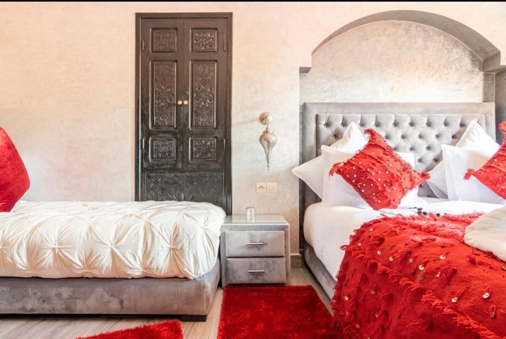 Postel nebo postele na pokoji v ubytování Riad Dar IMANE