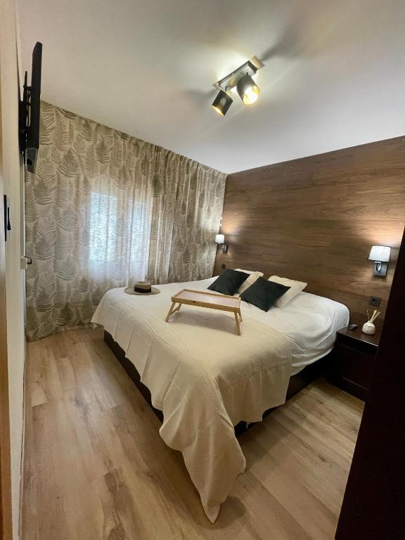 Postel nebo postele na pokoji v ubytování El balcón de Biescas.