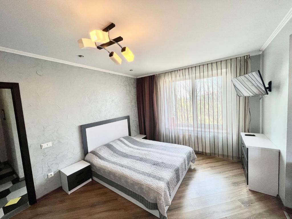 Giường trong phòng chung tại Apartment Halits'ka 133