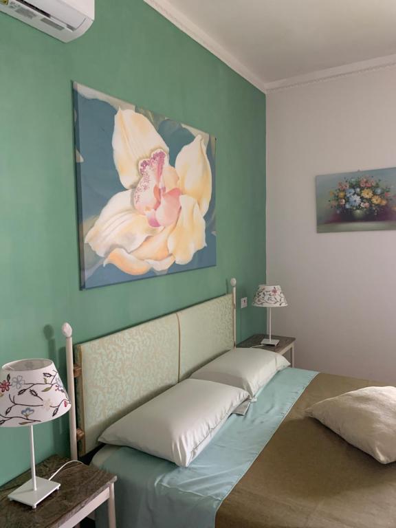 Łóżko lub łóżka w pokoju w obiekcie Dimora Di Mare Gallipoli