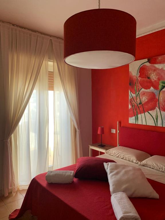 Łóżko lub łóżka w pokoju w obiekcie Dimora Di Mare Gallipoli