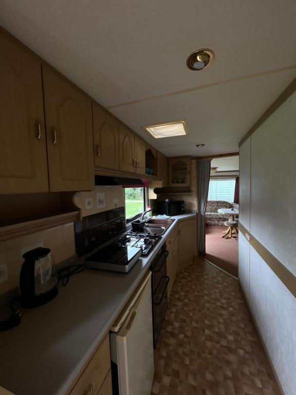 Kuchyň nebo kuchyňský kout v ubytování Autocamp Free Star - Mobilheimy