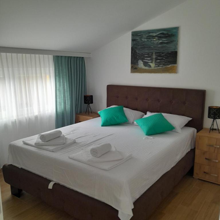 Postel nebo postele na pokoji v ubytování Spa Koncept-Apartmani