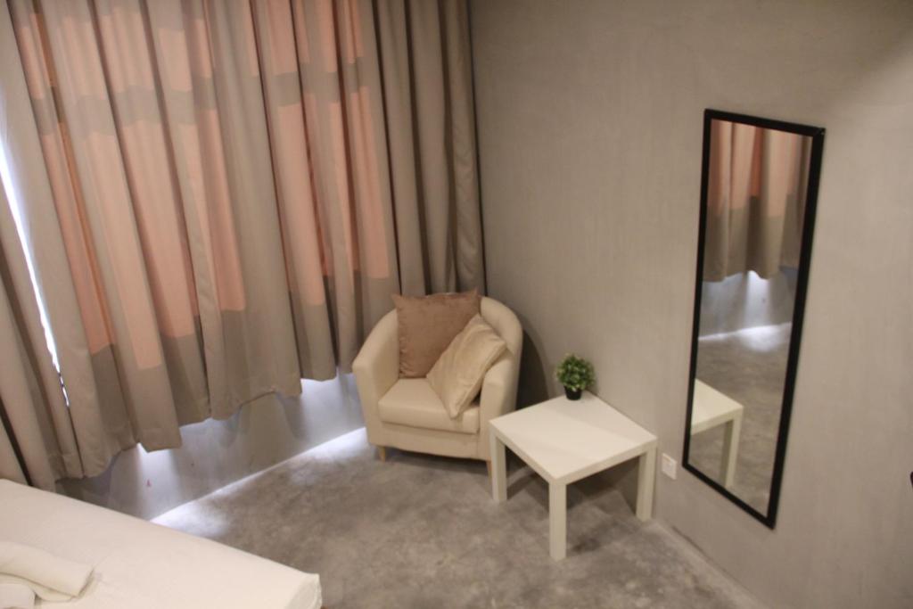 Posezení v ubytování Tido Hostel Penang