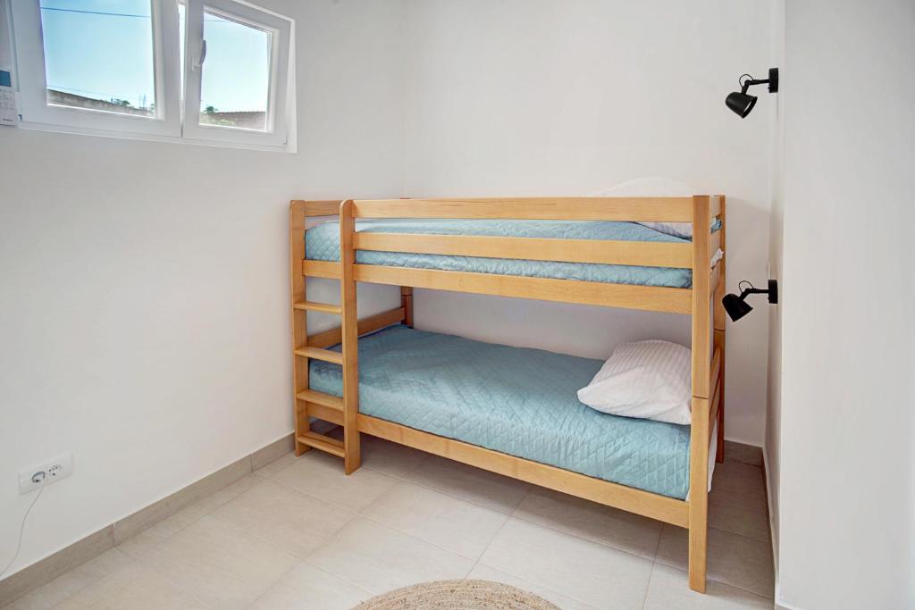Postel nebo postele na pokoji v ubytování BOKELJSKI CVIJET apartmani