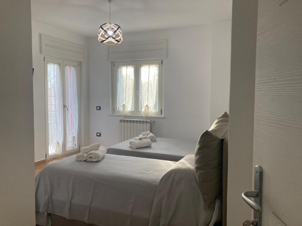 Postel nebo postele na pokoji v ubytování B&B Sabbia e Sassi
