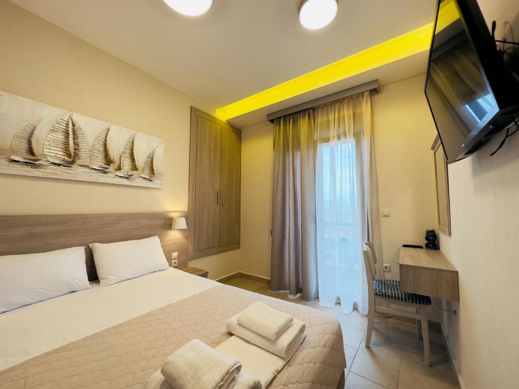 Postel nebo postele na pokoji v ubytování Yulia Luxury Apartments