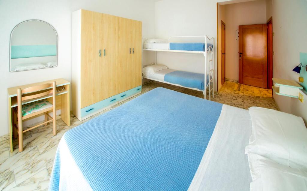 Postel nebo postele na pokoji v ubytování Albergo Il Veliero