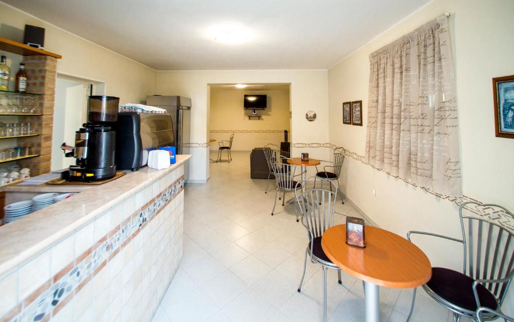 Kuchyň nebo kuchyňský kout v ubytování Albergo Il Veliero