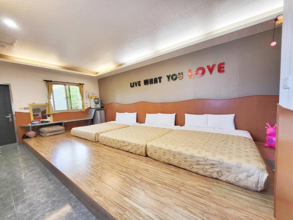 Letto o letti in una camera di Xing Ji Bungalow