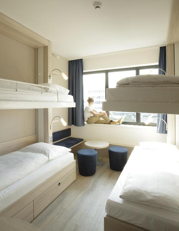 Postel nebo postele na pokoji v ubytování H2 Hotel Berlin-Alexanderplatz